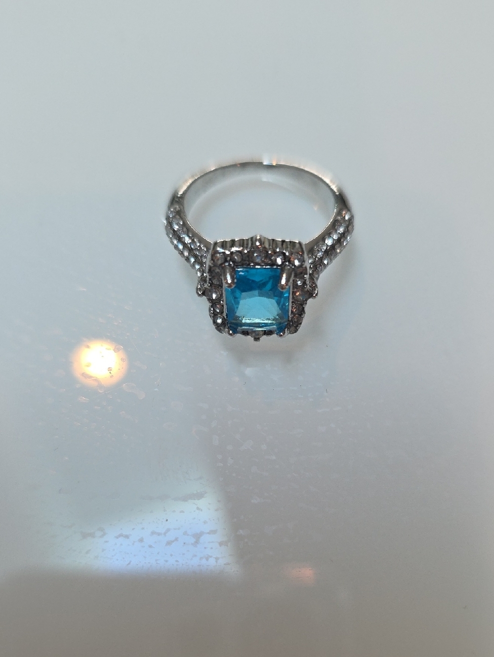 Sterling Silver Blue Square Topaz Gem Halo Ring With Diamond Accents